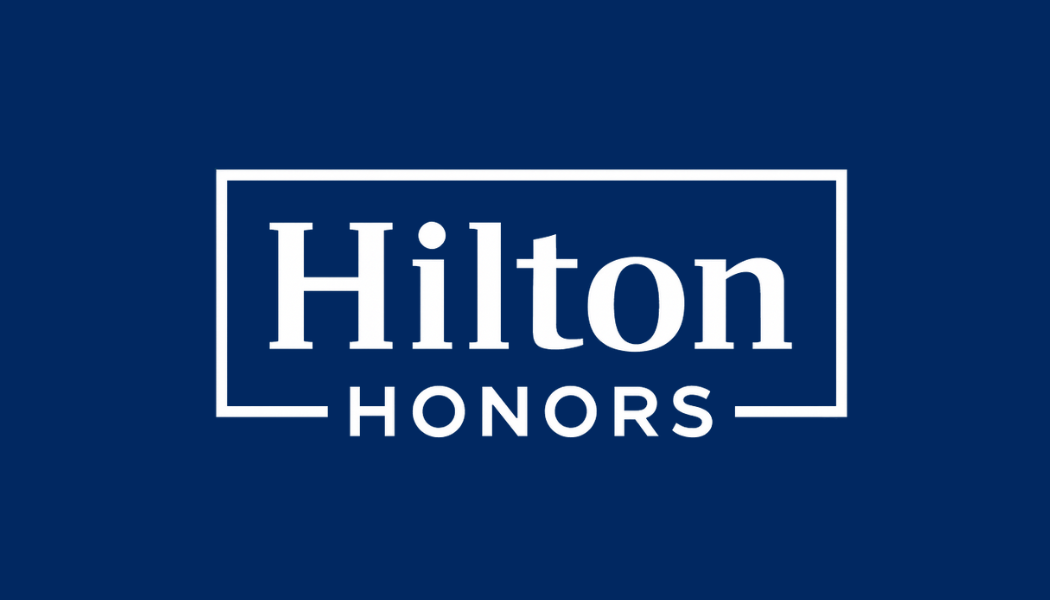 Hilton Honors logo in blue and white